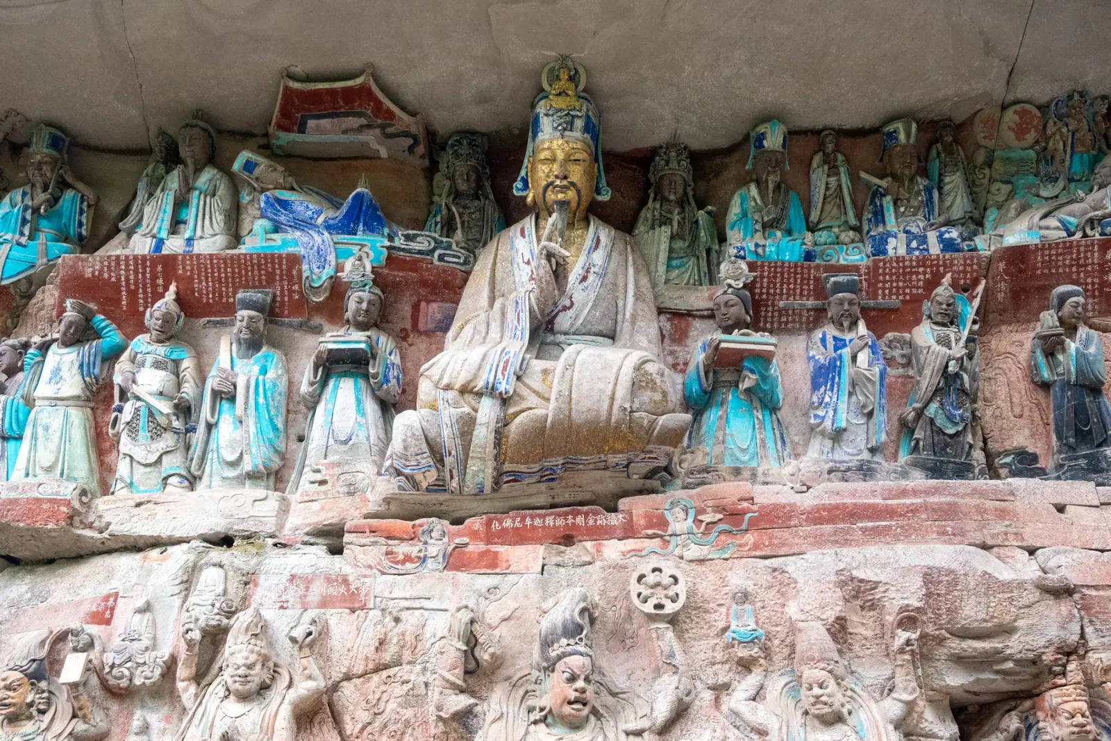 Detailed Buddhist cliff carvings at Baodingshan in the Dazu Rock Carvings complex