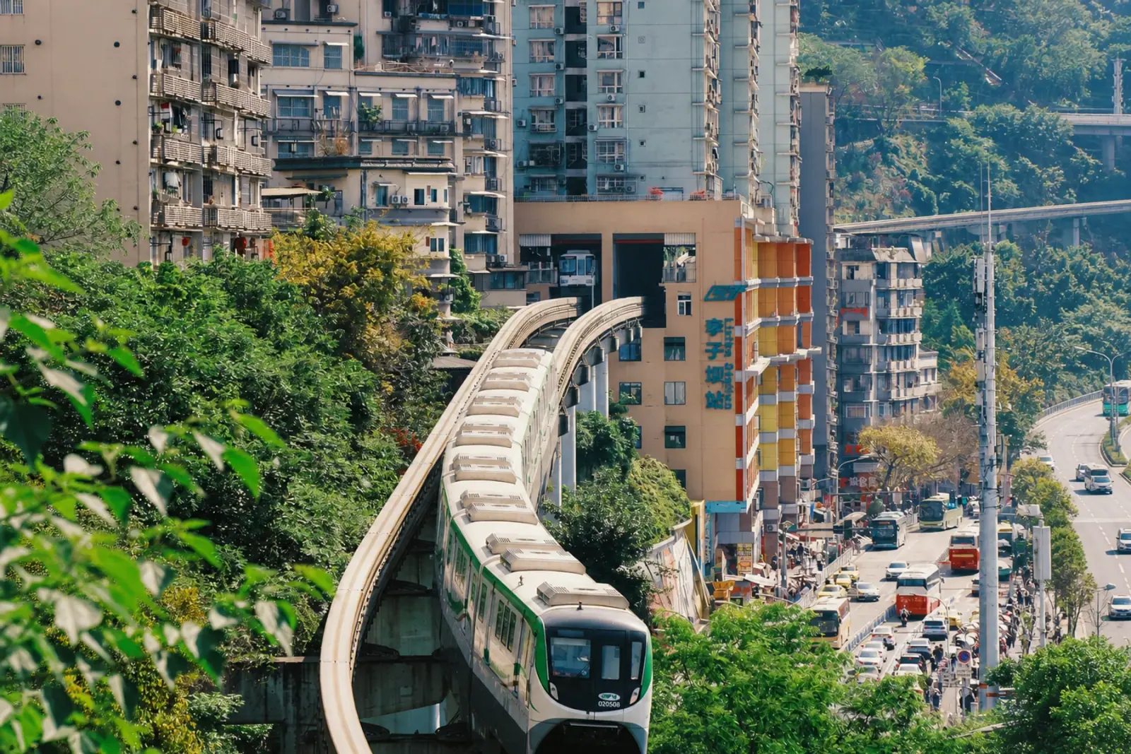 Chongqing monorail crossing a dense hillside neighbourhood